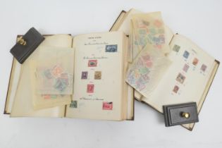 Two World stamp albums including Chilean 5 centavos, 1867; Costa Rica 5 centavos with oficial (