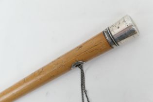 Georgian white metal topped cane, the metal unmarked, with wrigglework decoration, and with a