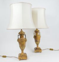 Pair of classical style ormolu mounted yellow marble table lamps, of urn shape with lion's mask twin