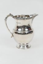 George V silver cream jug, by the Adie Bros., Birmingham 1935, baluster form with Celtic inspired