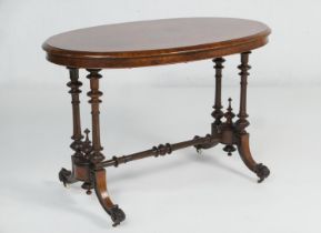 Victorian burr walnut and inlaid oval window or centre table, the top with quarter veneers and