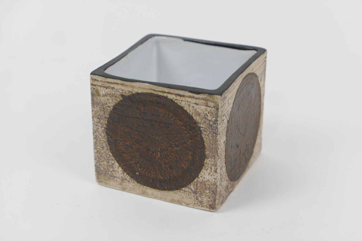 Troika cube vase, decorated with four brown discs in a textured finish against a buff brown
