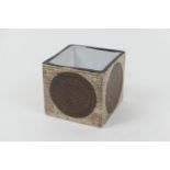 Troika cube vase, decorated with four brown discs in a textured finish against a buff brown