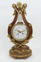 French walnut and ormolu lyre shaped mantel clock, white enamelled dial with Arabic numerals, the