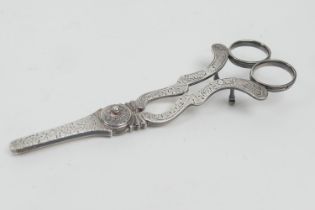 Pair of Dutch silver grape shears, engraved with fruiting vines, 16cm, weight approx. 85g (Please