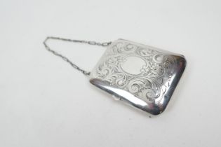 Sterling silver purse, circa 1920, rectangular cushion form with foliate engraving, opening to a