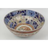 Japanese Fukugawa porcelain punch bowl, decorated throughout in Imari palette with underglaze