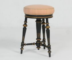 Victorian ebonised and gilt decorated revolving music stool, circa 1885, upholstered seat raised