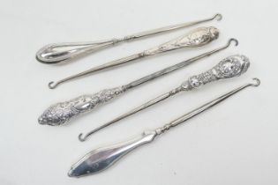 Five silver handled steel button hooks, various hallmarks (Please note condition is not noted. We