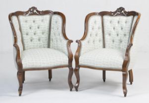 Pair of French walnut and upholstered tub chairs, early 20th Century, deep buttoned back and seat