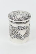 Late Victorian silver jar, Birmingham 1898, repousse decorated throughout and with a cherub to the