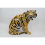 Large Italian terracotta model of a tiger, late 20th Century, hand decorated throughout, height 49cm