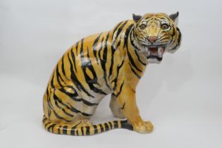 Large Italian terracotta model of a tiger, late 20th Century, hand decorated throughout, height 49cm