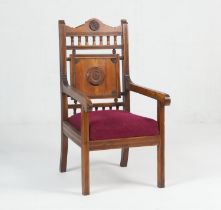 Unusual estate made yewood armchair, circa 1880-1900, with rail and target back, reeded arms and