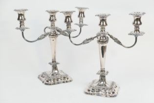 Pair of silver candelabra, by Edward Viners, Sheffield 1959, in Victorian style with two scrolling