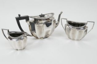 George V silver three piece tea service, maker FHA & Co., Birmingham 1925/6, comprising lidded