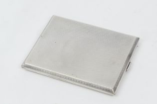 George V silver cigarette case, Birmingham 1928, rectangular form with engine turned decoration,