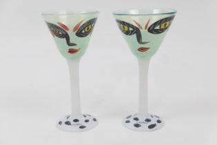 Pair of Kosta Boda hand decorated cocktail glasses, each painted with a Picassoesque face, signed by