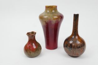 Bernard Moore bottle vase, decorated with a goldstone type glaze in amber and other flambe