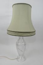 Cut crystal glass table lamp, ovoid form with domed foot, height to the fitting 58cm, with a sage
