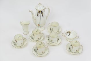 Royal Doulton china coffee service, pattern no. 1112, having a gold and black tree with stylised