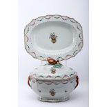 A scalloped tureen and stand