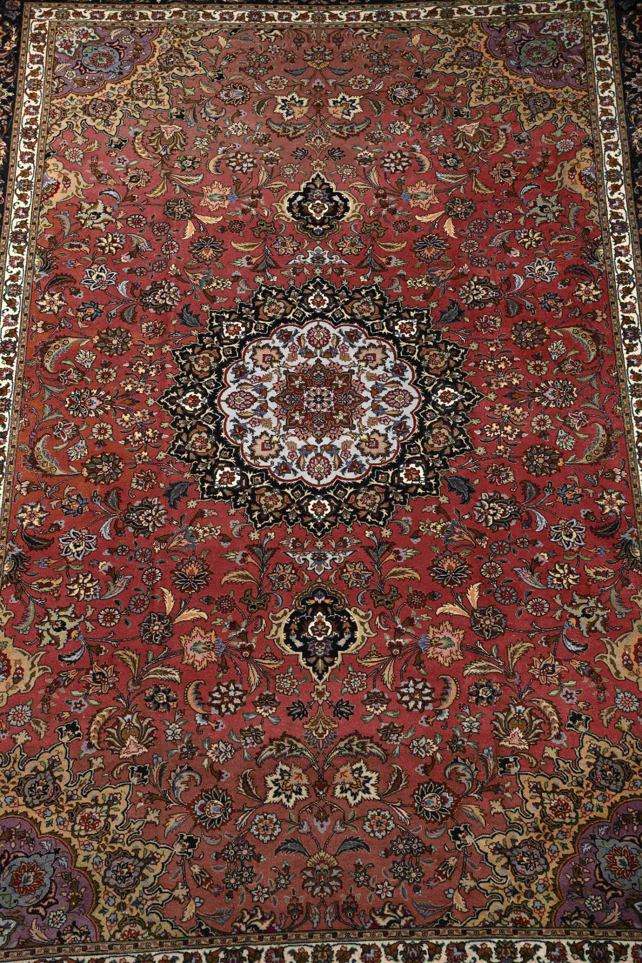 A Tabriz carpet - Image 2 of 3