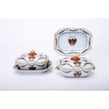 A pair of small tureens with stand