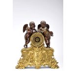 A table clock - Two sculptures "Alegorical Putti to literature and Painting"