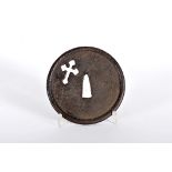 A Tsuba (sword guard)