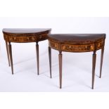 A pair of demi-lune game tables