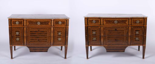 A pair of chest of drawers