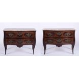 A pair of chest of drawers