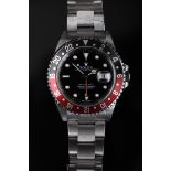 A ROLEX wristwatch - model GMT MASTER II "COKE"