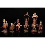 Six chess pieces - red bishops, knights and rooks «howdah»