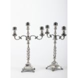 A pair of four-foot candlesticks with three-light serpentines