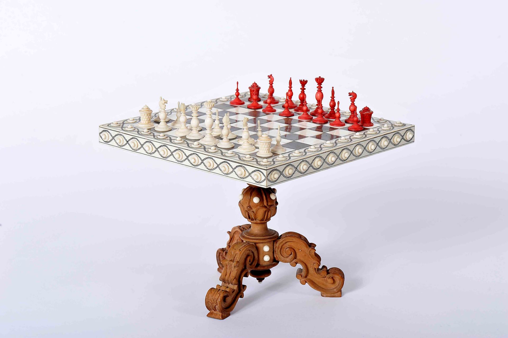 A miniature Game Table with miniature Chess Pieces