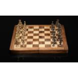 Chess pieces "Roman Armies" and chessboard closing in a box shape