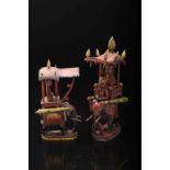 Two chess pieces - red king and queen «howdah»