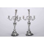 A pair of four-light candelabra