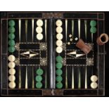Articulated chess and backgammon board closed in the shape of a box with backgammon pieces
