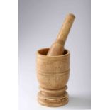 A mortar with pestle