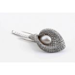 An arum lily shaped brooch