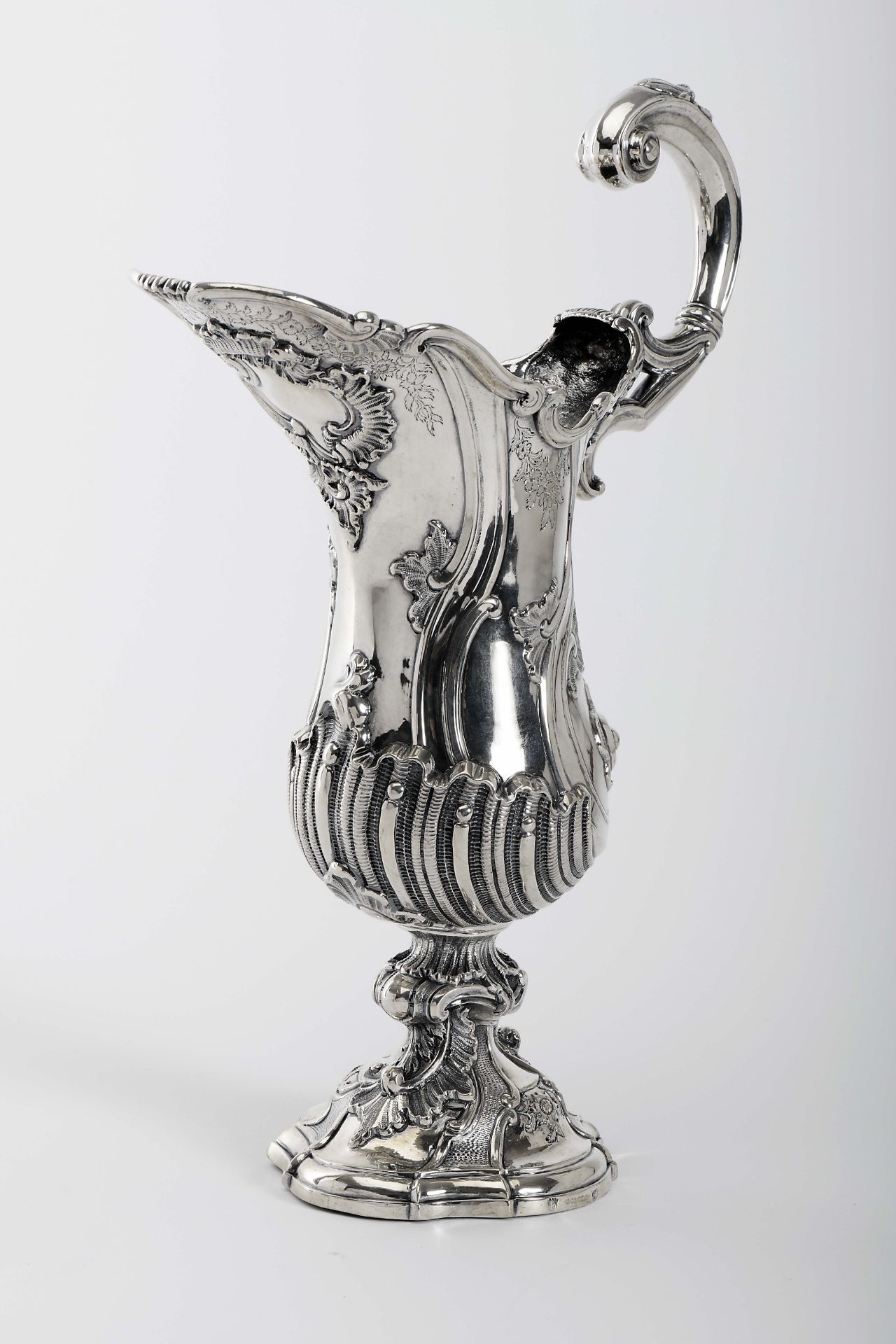 Ewer with open handle