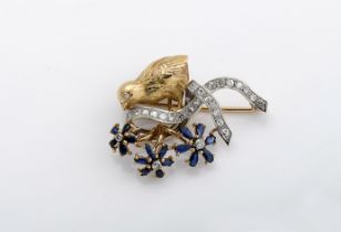 A brooch "bird perched on a branch"