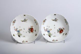 A pair of scalloped soup plates