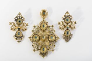 A pendant and a pair of earrings