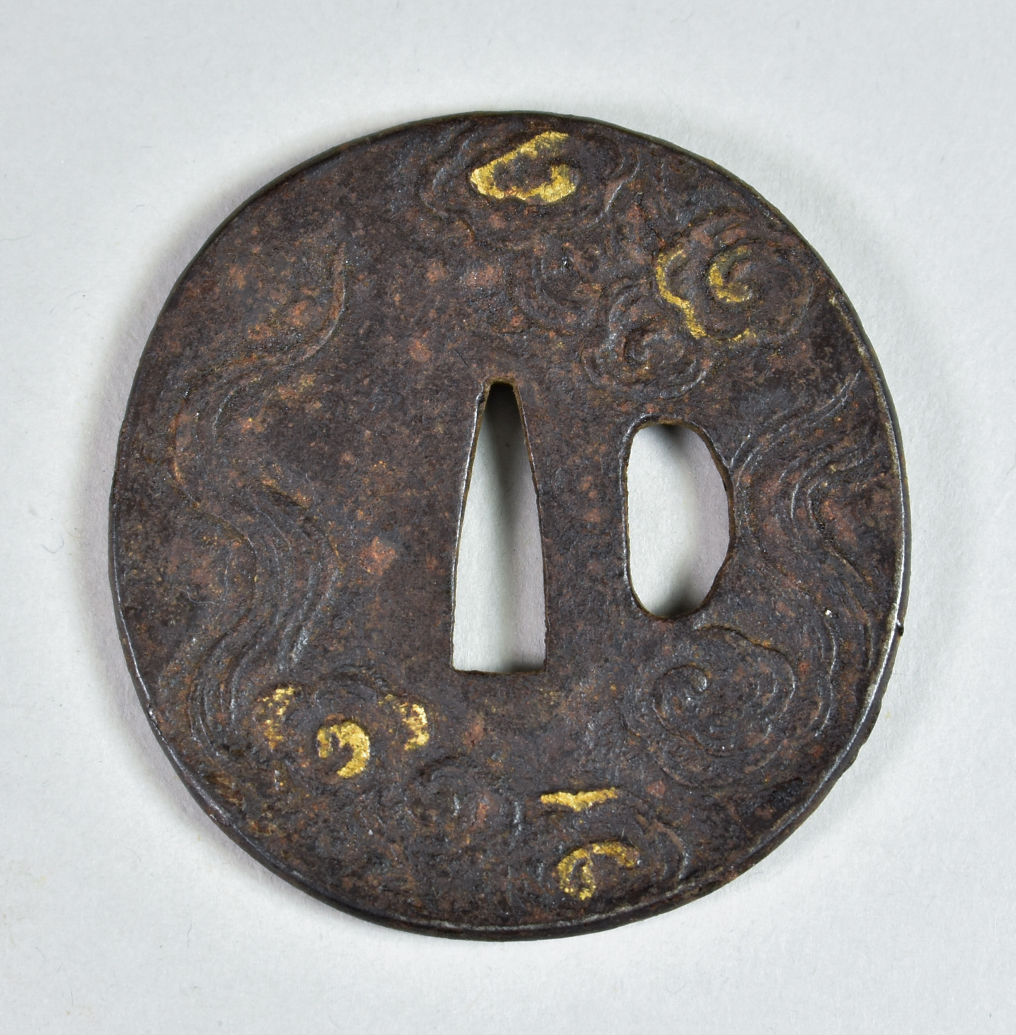 A Japanese Tsuba, iron Mokko-gata depicting dragons chasing the sacred pearl, Edo period (1615- - Image 2 of 2