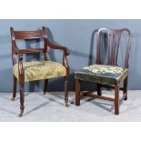 A 19th Century Mahogany Open Armchair, with reeded panel crest rail, scroll arms, upholstered seat