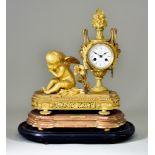A 19th Century French Gilt Metal Mantel Clock retailed by Howell James & Co., the 3ins white